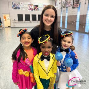 Rosie Kovatch and three of her young dancers